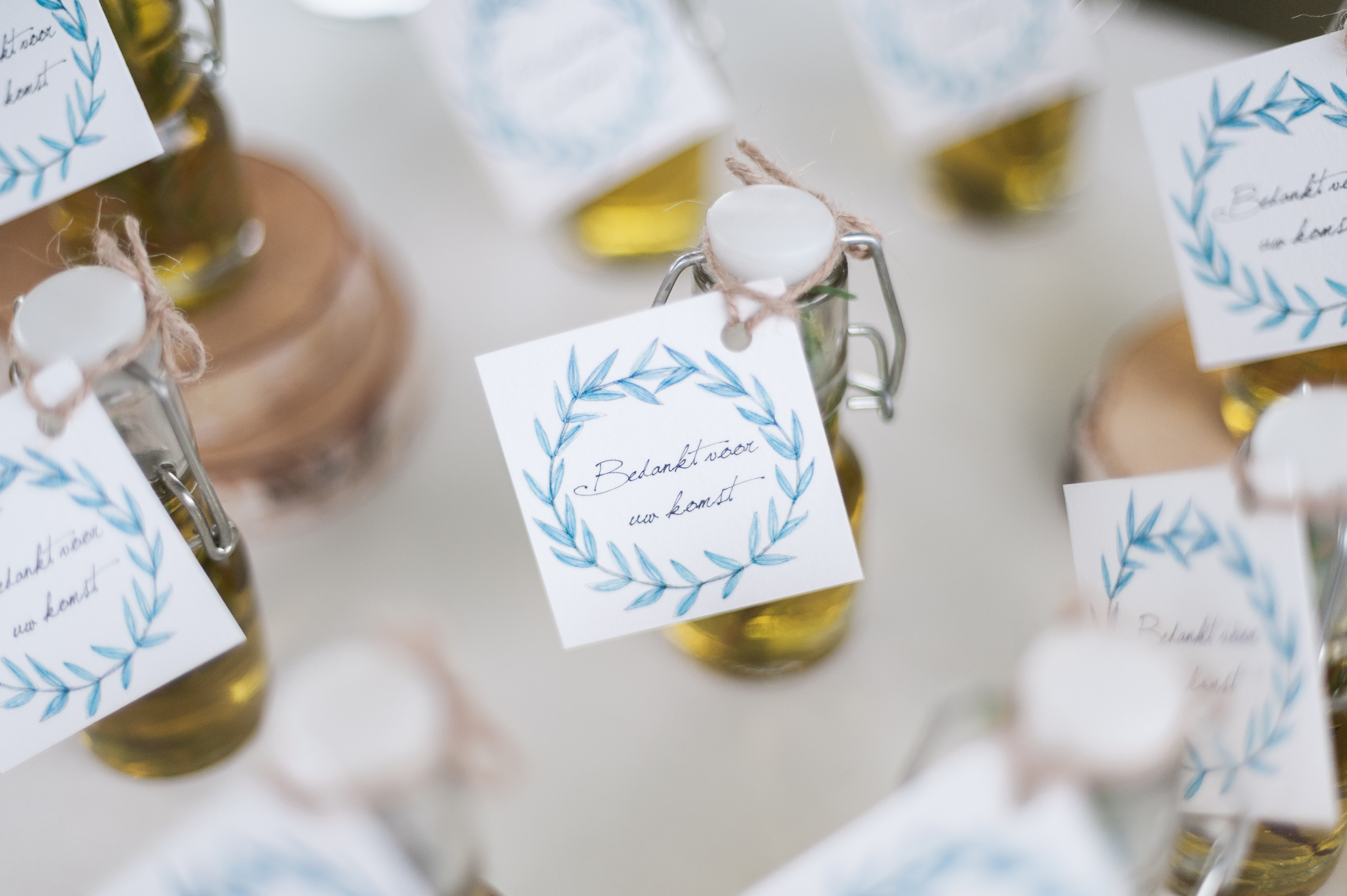 An olive oil bottle used as a giveaway at a destination wedding in Greece