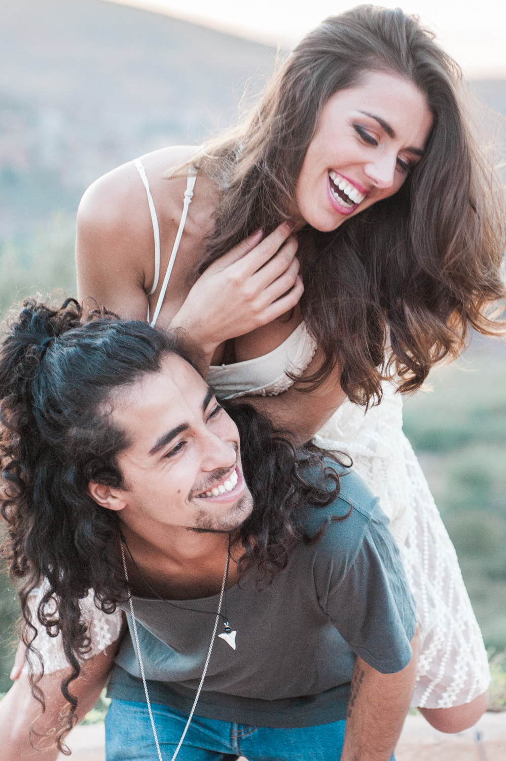 A couple having fun at their love shoot with a photographer in Marrakech