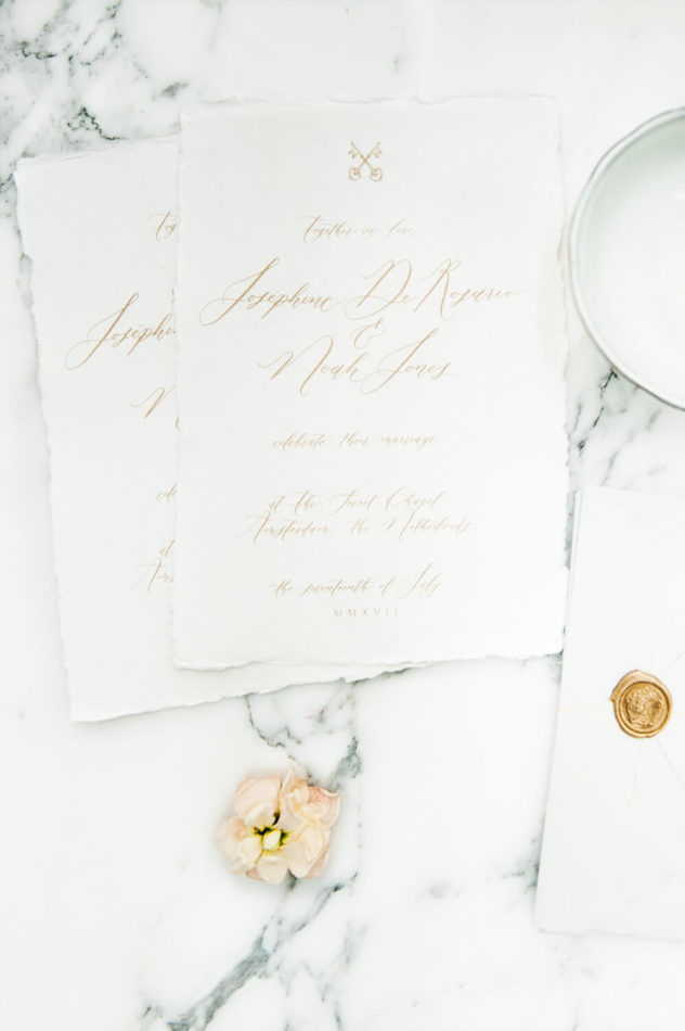 A ring idsh and an invite to a destination wedding in Amsterdam
