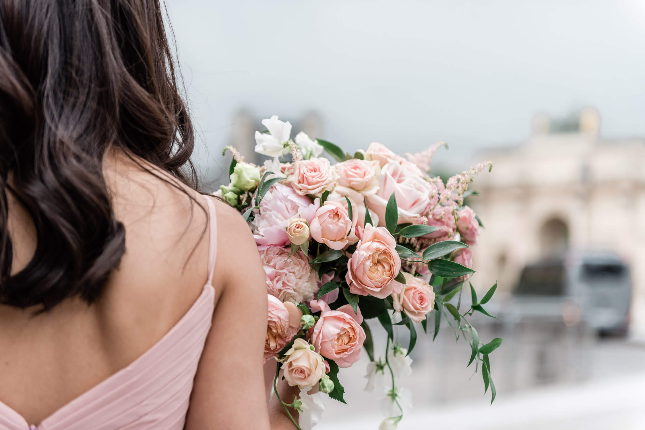 Photojournalistic bridesmaid bouquet shot of an elopement at the Ritz in Paris